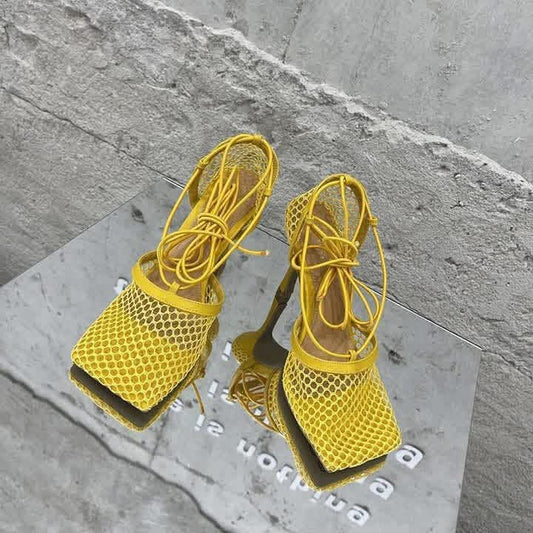 Fishnet square toe heels